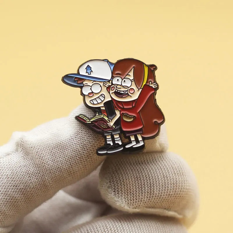 Enamel pins featuring a boy and girl character set for backpacks and jackets