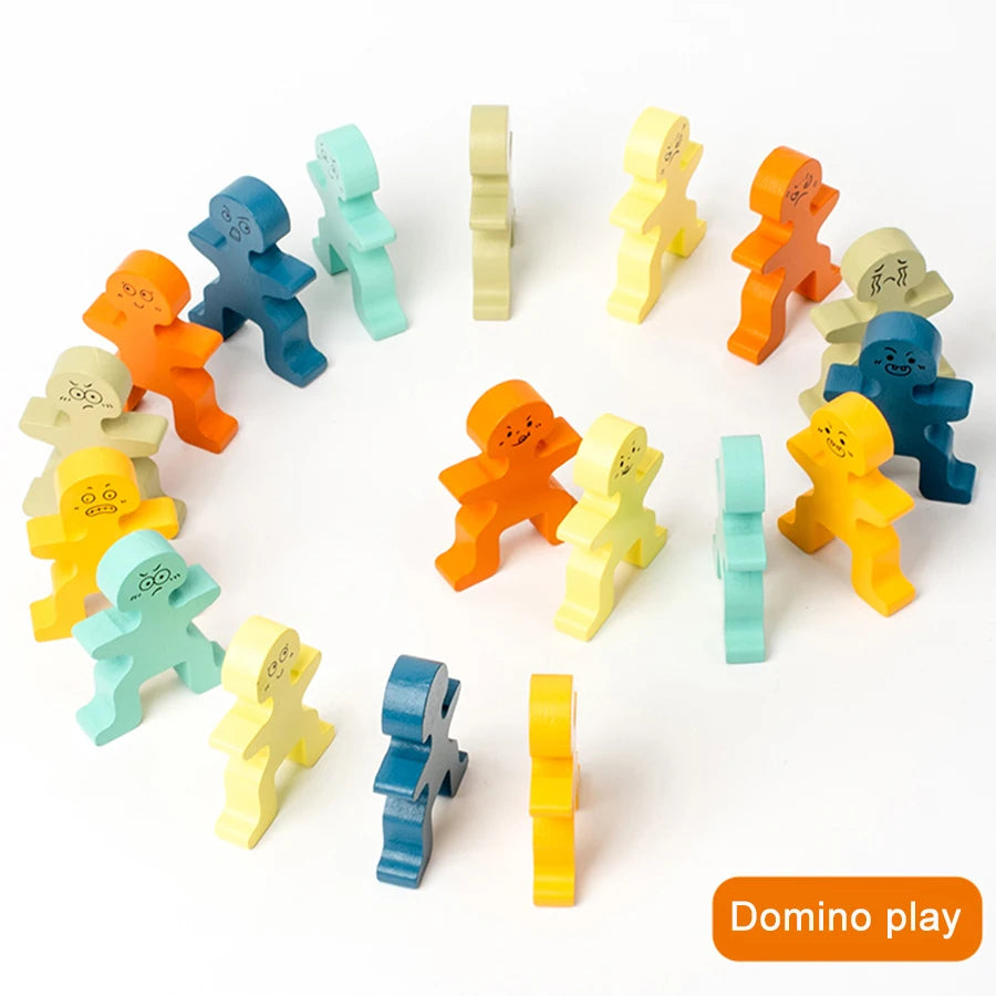 A set of wooden domino blocks in various colors arranged in a circular pattern for a domino play game.