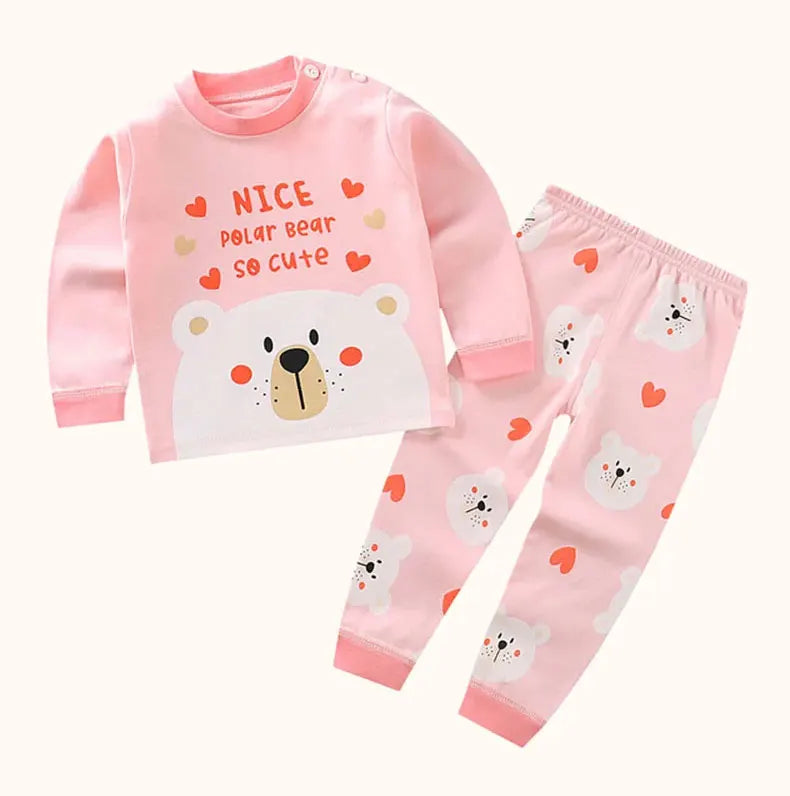 Pink kids pajama set for a baby featuring a polar bear design with cute hearts