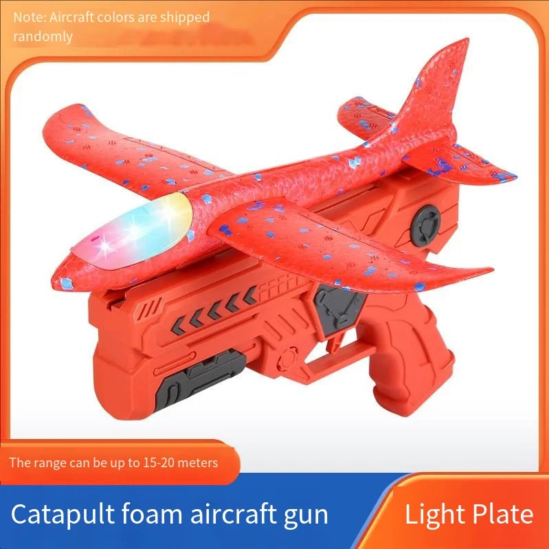 An orange foam aircraft gun with red wings and a light plate, designed for catapult toy play.