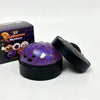 A black box of Halloween Mystery Blink Box and a black squishy stress relief toy with a purple glow.