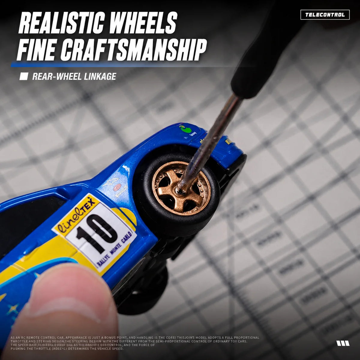 A close-up of a blue RC drift car with rear-wheel linkage and a thin metal rod being used for fine craftsmanship.