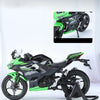 A green and black 1:12 scale Ninja motorcycle diecast model with lights and sound displayed on a white background.