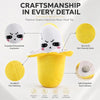 Jouet en peluche jaune en forme de fruit, avec expressions brodées et capteurs tactiles pour la musique interactive.