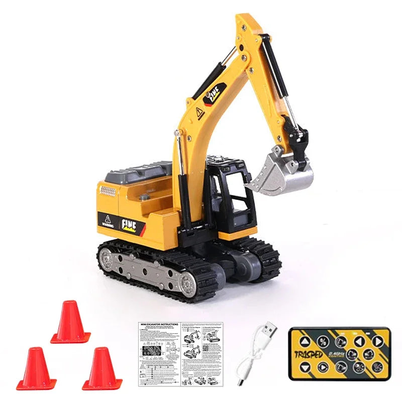 A yellow mini RC excavator model with black details and tracks, shown next to several red traffic cones.