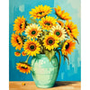 A bouquet of bright yellow sunflowers in a green vase against a blue background.