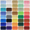 A grid of various colored 3mm cotton macrame cord for DIY crafts and boho decor.