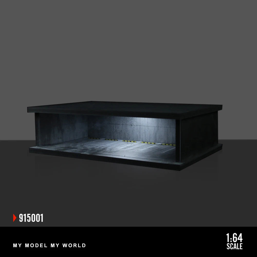 A black LED light-up underground garage diorama for diecast cars.