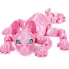 A pink articulated 3D printed figurine of a Sphynx cat with wrinkled skin.