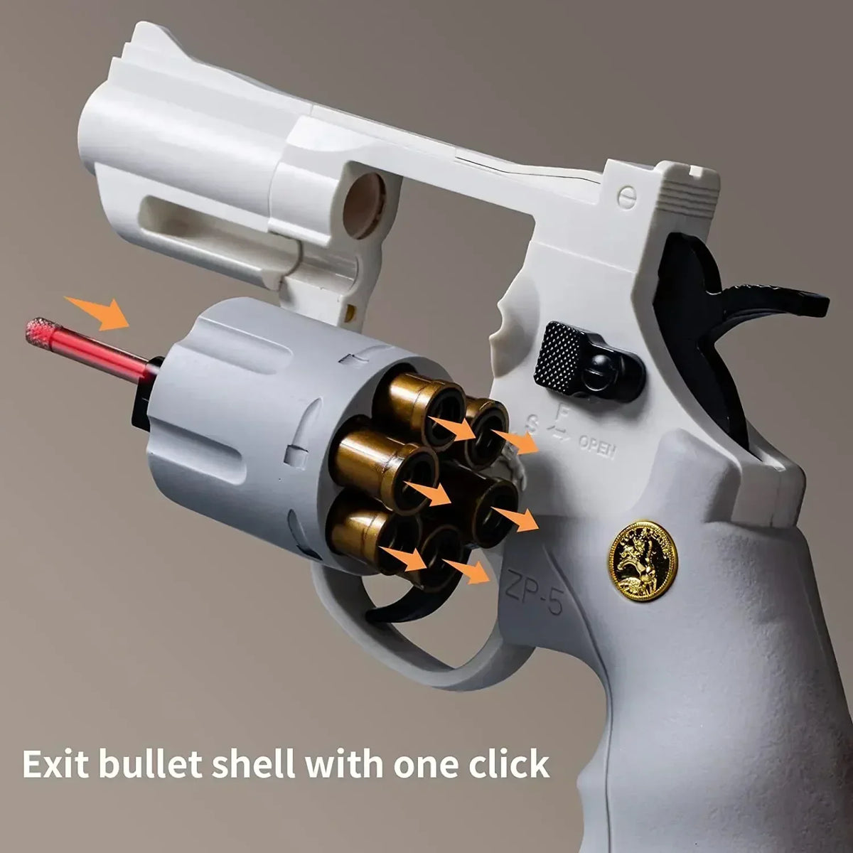 Pistolet jouet de feu continu blanc avec une balle de sortie en cours de libération.