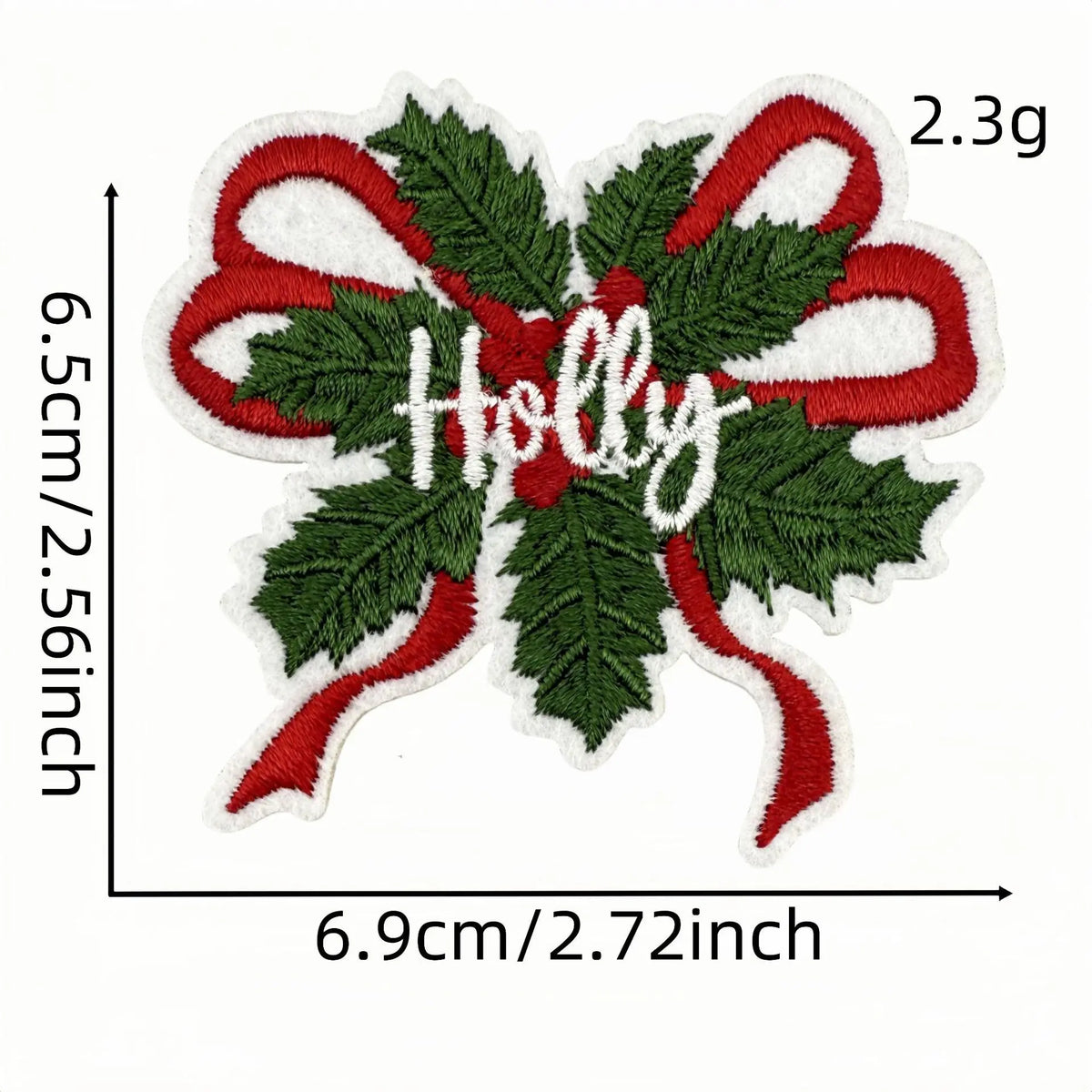 A green felt iron-on patch featuring the word Holly in white embroidery surrounded by red ribbon and holly leaves.