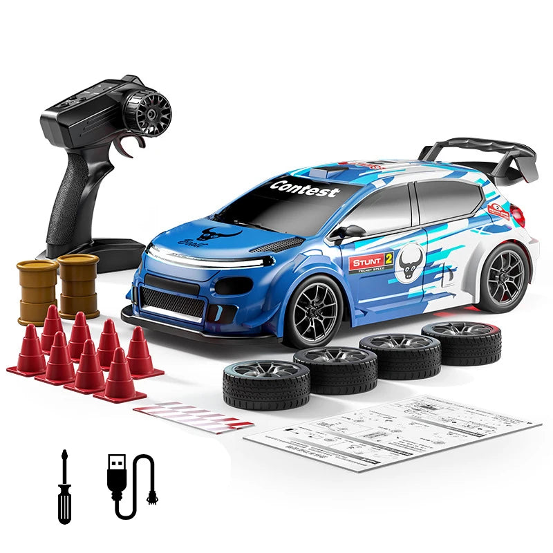 A blue RC drift car is shown with a remote control, tires, and a set of tools on a white background.
