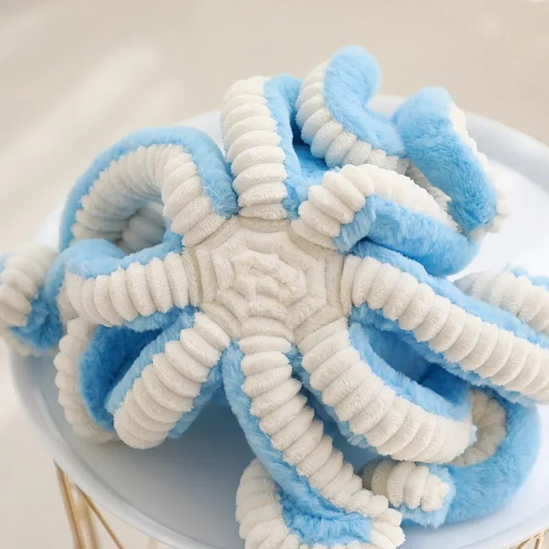 Adorable octopus plush toy with blue and white textured fur