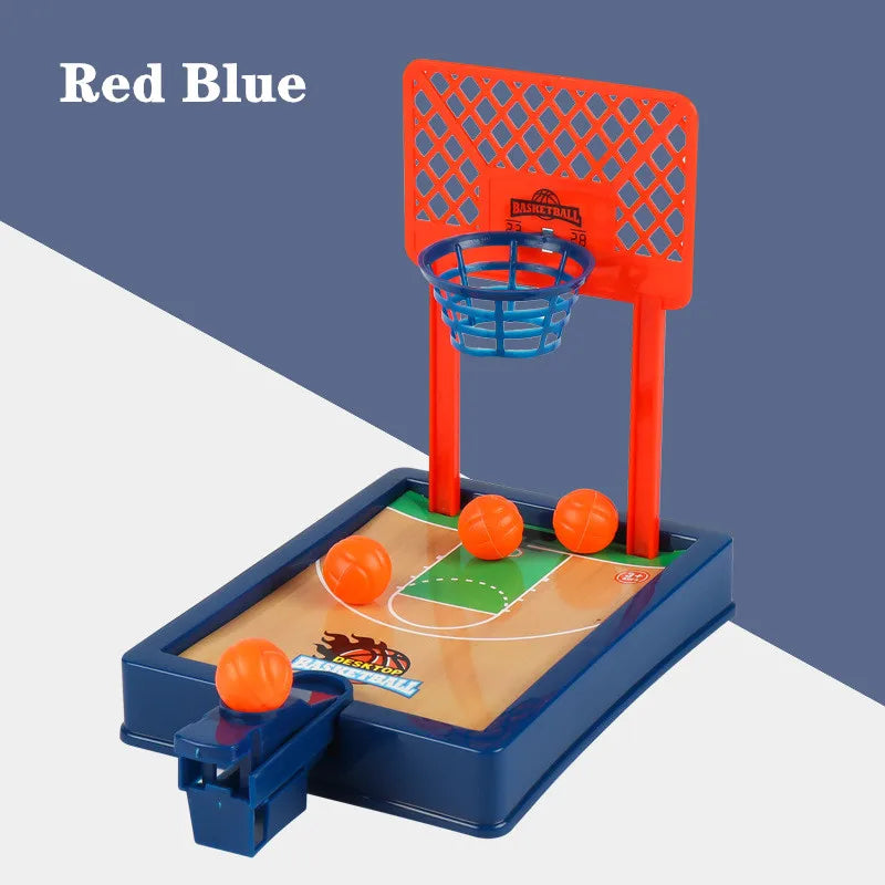 A red and blue mini tabletop basketball arcade game featuring a hoop and court for two players.