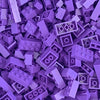 A pile of purple building blocks used for creative DIY projects.