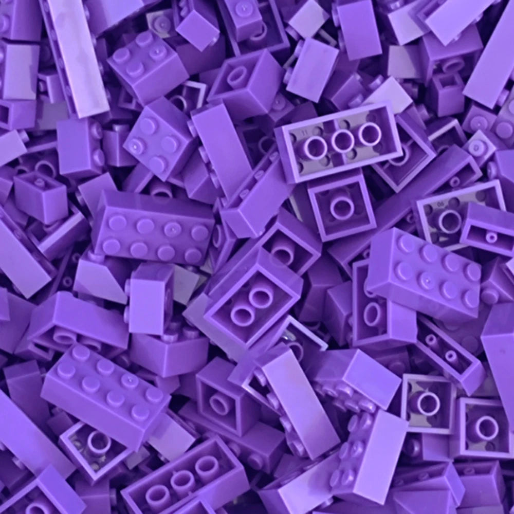 A pile of purple building blocks used for creative DIY projects.