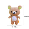 A soft brown Rilakkuma anime plush bear with light green ears and a white belly.