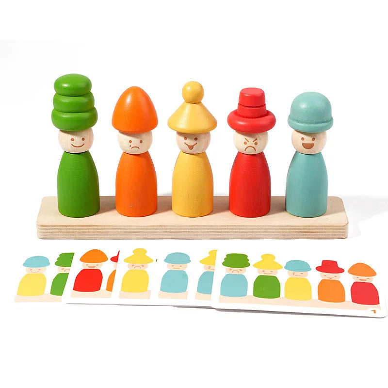 A set of wooden stacking toys depicting various emotions in different colors and sizes.