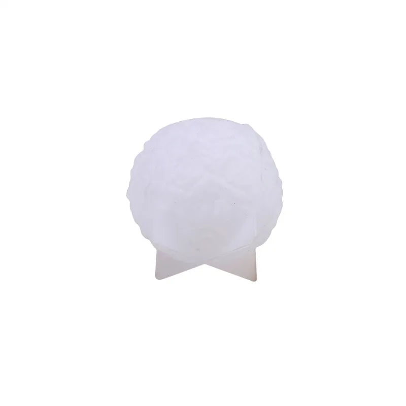 White silicone mold shaped like a rose flower ball for DIY candles