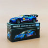 A blue and orange Tomica Subaru BRZ R&D Sport die-cast model car in its box.