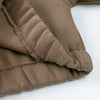 A close-up of a brown fleece hooded tracksuit set for children, showing the ribbed texture and fabric detail.