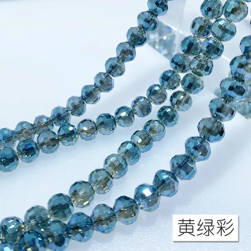 A set of 10mm Austrian crystal beads with an AB coating in shades of blue and gray.