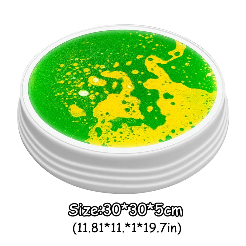 A circular mat with green and yellow liquid or gel, used as an interactive LED balance stone for kids.