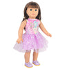 A doll wearing a pink unicorn top and purple tulle skirt with purple shoes.
