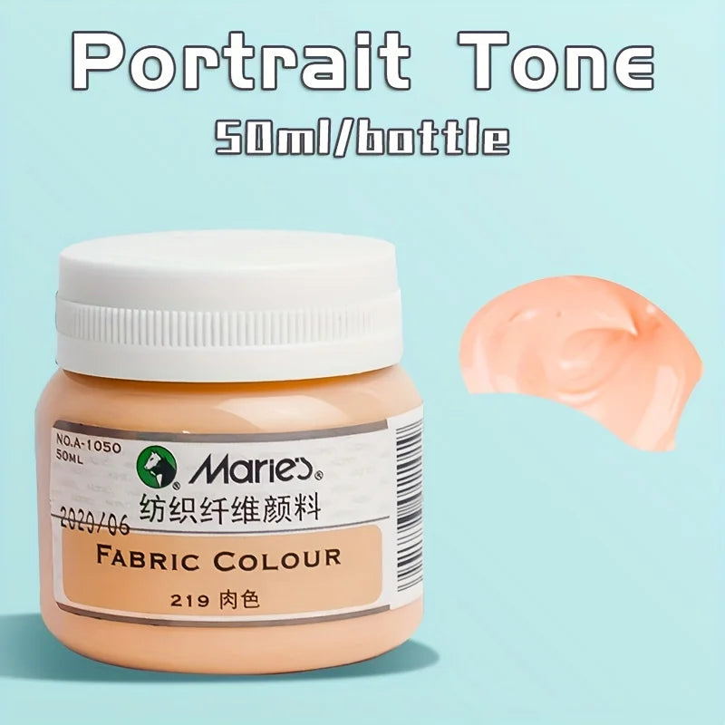 A bottle of Marie Fabric Colour paint tone in a light peach shade, showing the product label and a swatch.