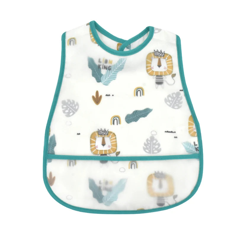 White waterproof baby bib with a cartoon pattern featuring lions, leaves, and rainbows.