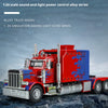 A red and blue American-style mop head Peterbilt 389 truck model in 1:24 scale with simulated sound and light features.