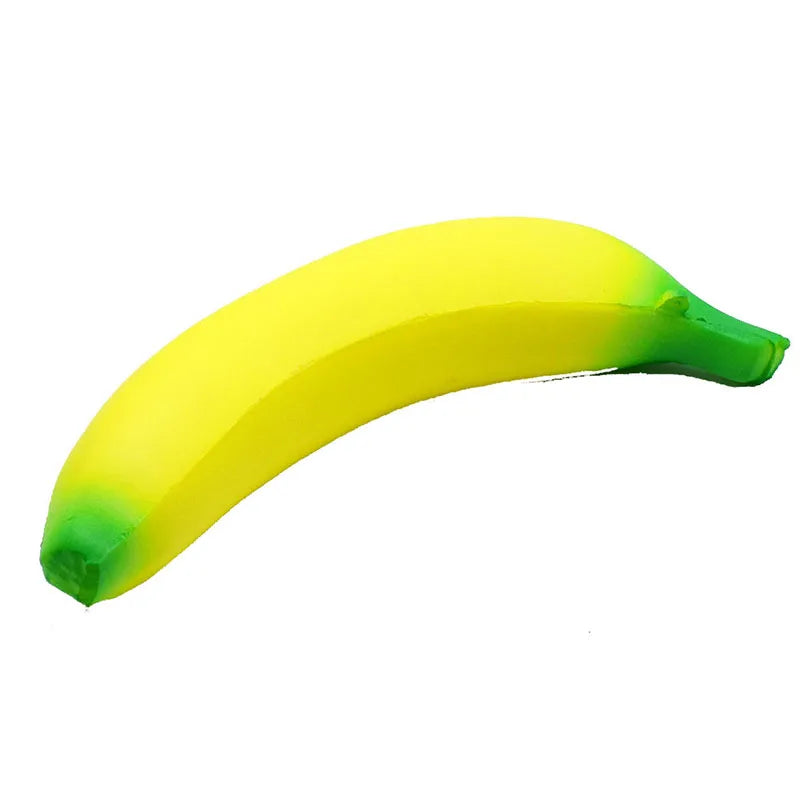 A bright yellow squishy banana stress reliever toy with green accents.