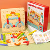 A red box of a Creative Board puzzle set with wooden pegs and pieces laid out on a light green surface.