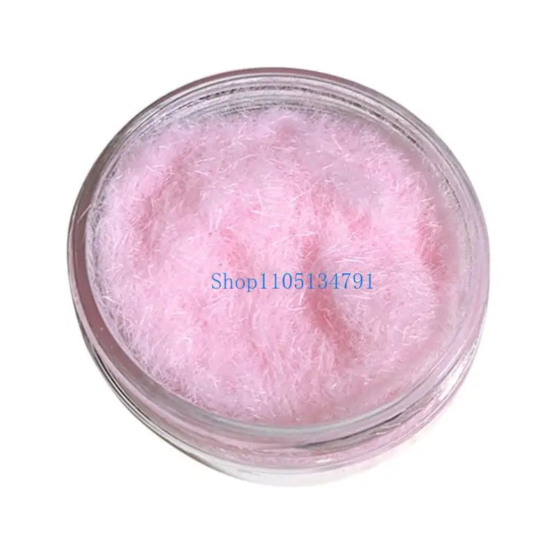 A clear jar filled with pink adhesive flocking powder used for jewelry making and crafts.