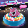 A unicorn-themed light-up toy featuring a horse head on a colorful glowing base.