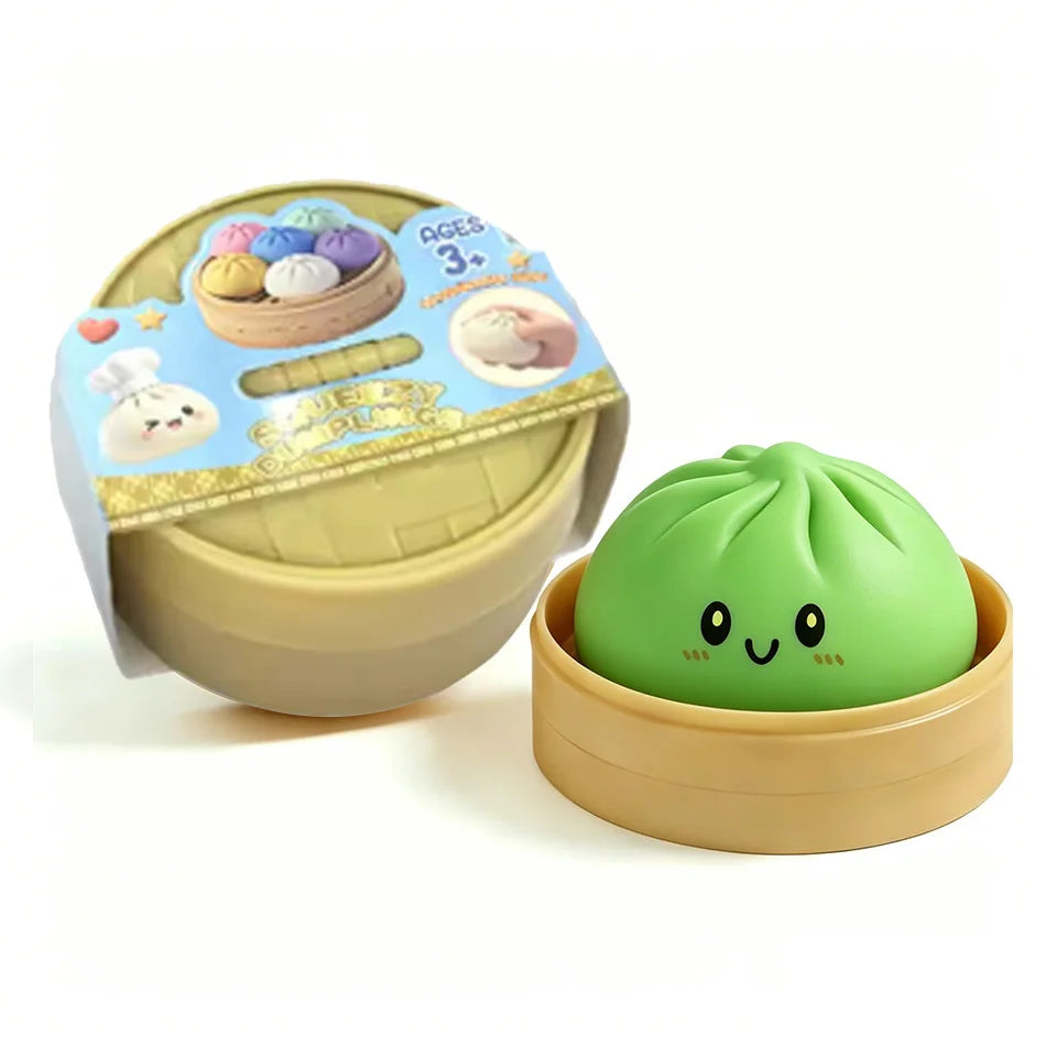 A green dumpling squishy stress ball with a light brown steamer basket and age 3+ packaging.