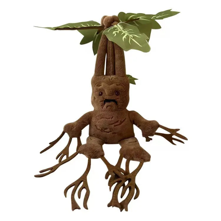 A brown mandrake plush toy with green leaves growing from its head.