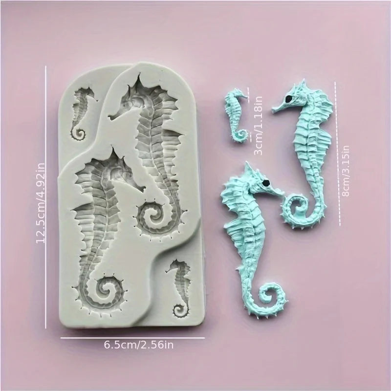 A silicone mold featuring detailed seahorse shapes for resin and clay crafts, displayed on a pink background.