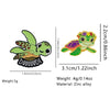 A set of cute green turtle enamel pins featuring vibrant colors and detailed scales.