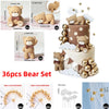 A set of 36 bear cake toppers including seated, standing, and decorative bears, along with gold balls and clouds.