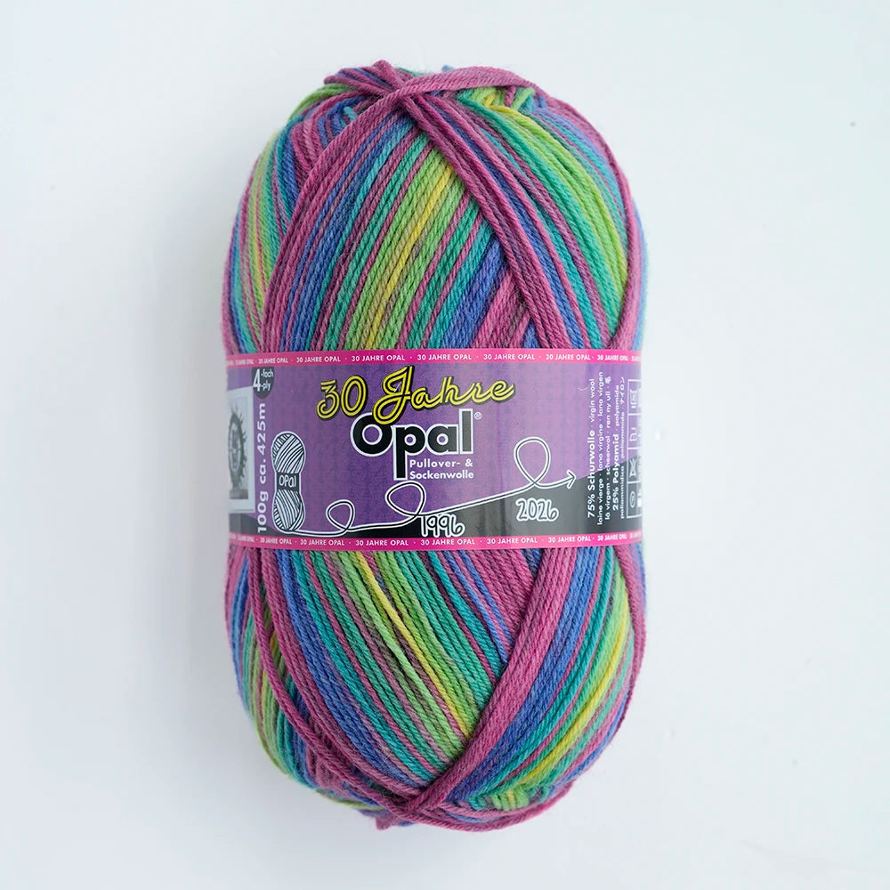 A ball of 100g Opal 4-ply sock yarn in a multicolored blend of pink, green, and yellow threads.