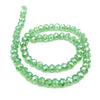 Green faceted crystal beads strung together for jewelry making