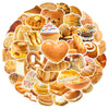 A circular arrangement of various baked goods and pastries, including bread, croissants, donuts, muffins, and sweet buns.