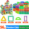 A collection of colorful magnetic building blocks and geometric shapes in various sizes and colors for STEM learning.