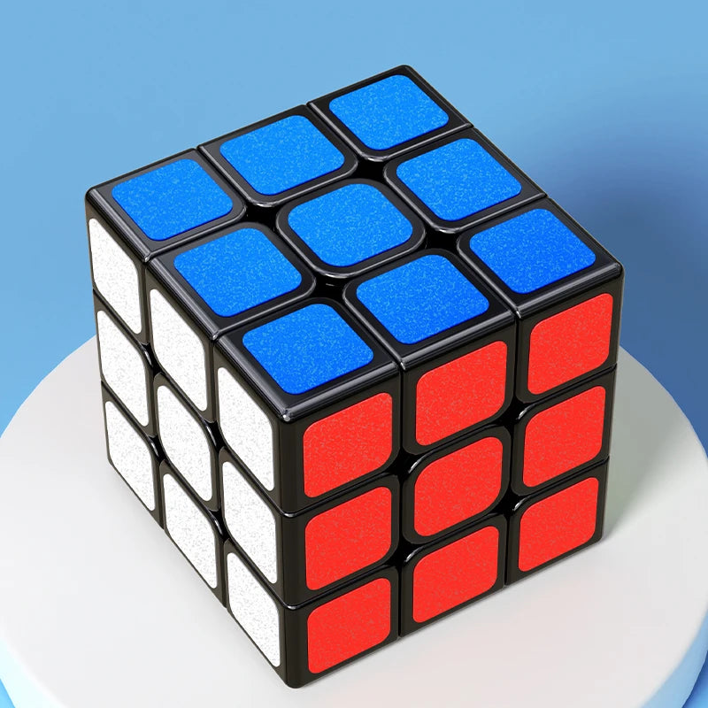 A 3x3 magic cube puzzle with black and blue faces, shown from above.