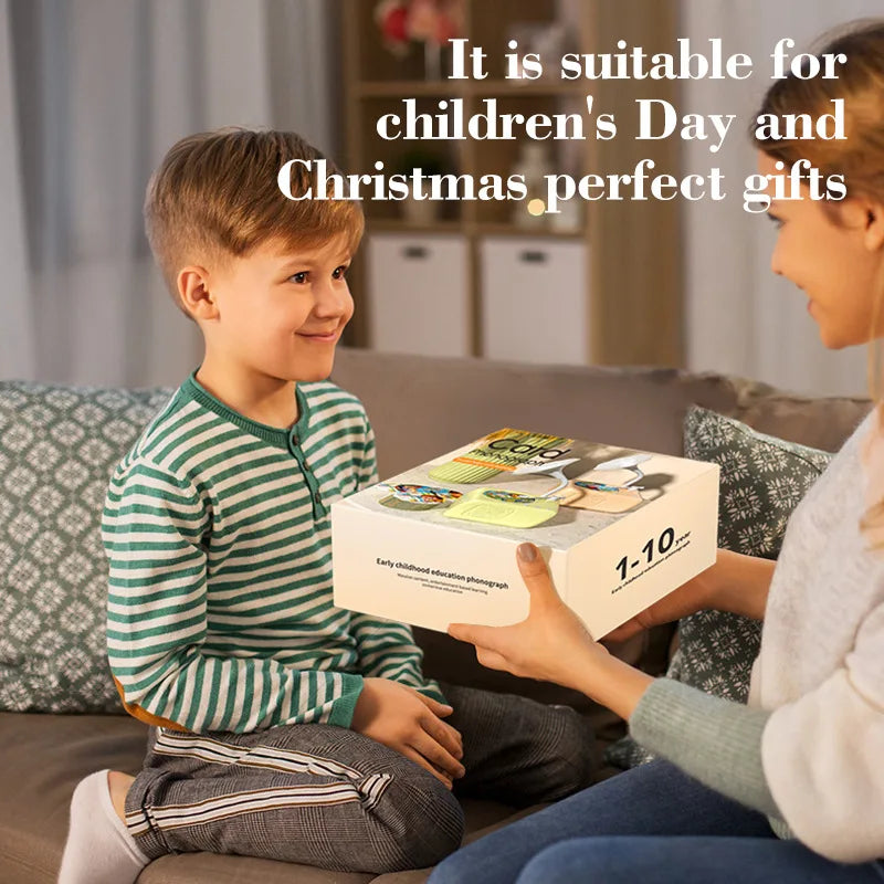 A young boy is shown interacting with a box of learning cards, suitable for children's gifts.