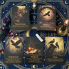A collection of dark-themed oracle cards featuring imagery of ravens and spiritual themes set on a blue fabric.