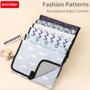 A stack of colorful fabric fashion patterns for a baby's growth accompanying a portable foldable waterproof diaper changing p