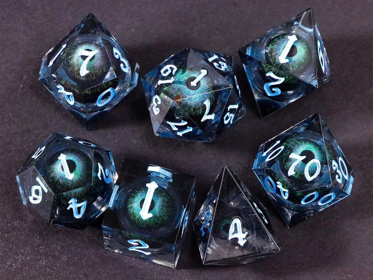 A collection of seven polyhedral resin dice, including a d20 and d12, resting on a dark surface.