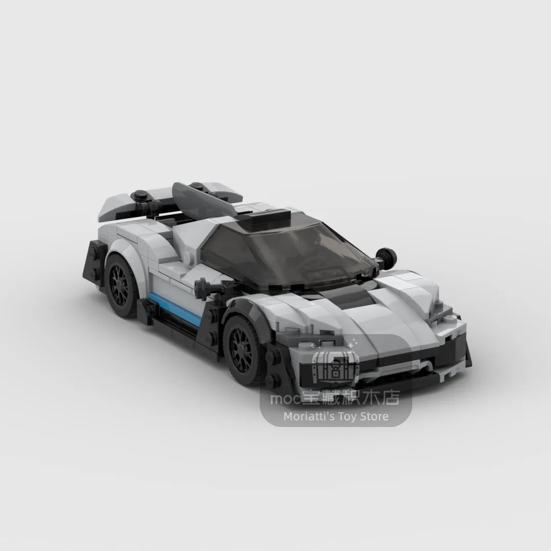 A detailed model of a classic supercar built from gray and black building blocks.